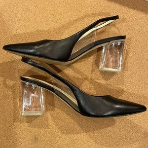 Very cool, black Marc Fisher pumps with lucite heel.
